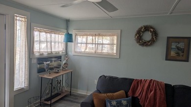 Escape to this beautifully renovated coastal getaway, offered - photo 10