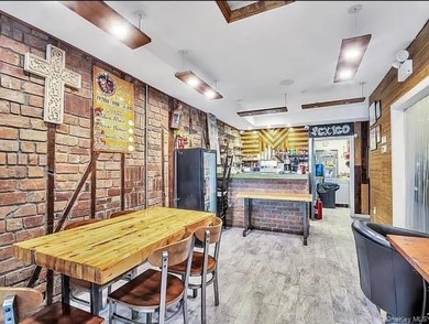 Fantastic opportunity to own a beautifully renovated mixed-use - photo 7