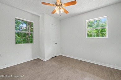 This cozy retreat home is in Bayou La Croix Estates, Bay St - photo 11