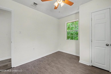 This cozy retreat home is in Bayou La Croix Estates, Bay St - photo 12