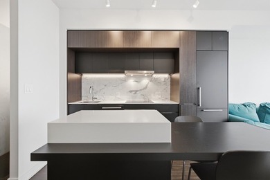 Magnifique condo au 43e etage de la prestigieuse Tour des - photo 2