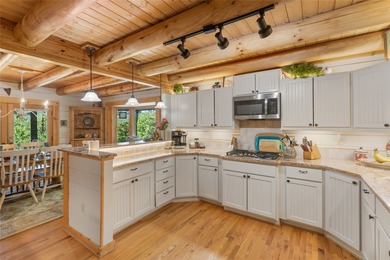 Discover the timeless appeal of mountain living in this classic - photo 46