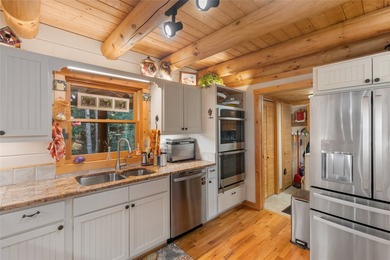 Discover the timeless appeal of mountain living in this classic - photo 47