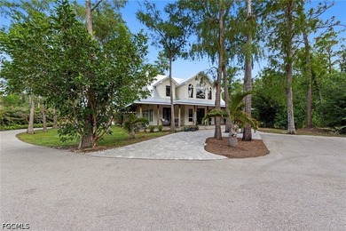 Tucked behind a private gated entrance on a lush 2.5 acre wooded - photo 2