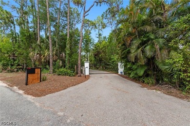 Tucked behind a private gated entrance on a lush 2.5 acre wooded - photo 3