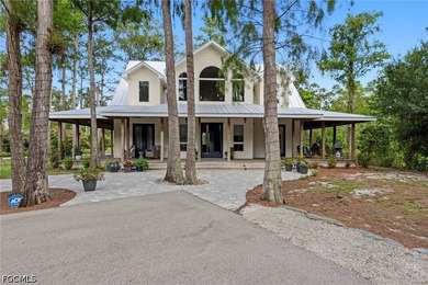 Tucked behind a private gated entrance on a lush 2.5 acre wooded - photo 5