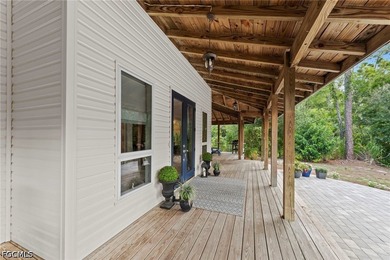 Tucked behind a private gated entrance on a lush 2.5 acre wooded - photo 7