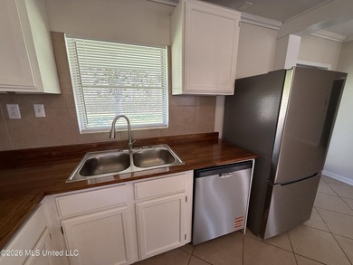 Beautifully remodeled brick ranch just a short walk to the beach - photo 12