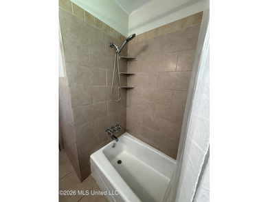 Beautifully remodeled brick ranch just a short walk to the beach - photo 19