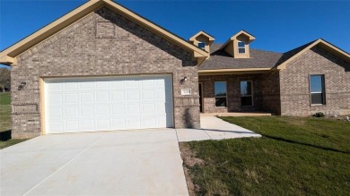 Lake Home For Sale in Runaway Bay, Texas