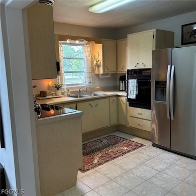 Charming two-bedroom two bath home sitting on a spacious corner - photo 3