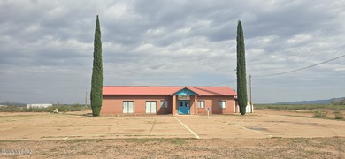 This rare lodge-style brick building features a durable