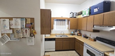 This rare lodge-style brick building features a durable