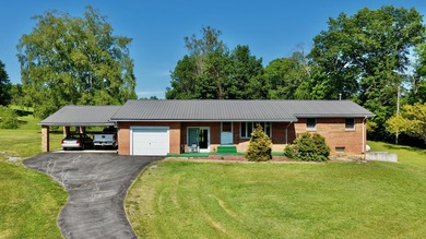 Welcome to The Hideaway! Charming brick ranch offering the - photo 1