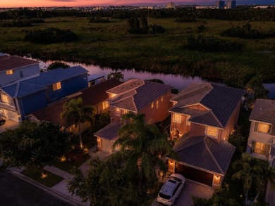 Welcome to this elegant canal-front residence located in the - photo 2