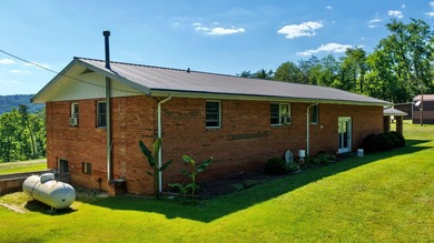 Welcome to The Hideaway! Charming brick ranch offering the - photo 5