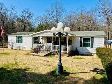 Lake Home For Sale in Coffeeville, Mississippi