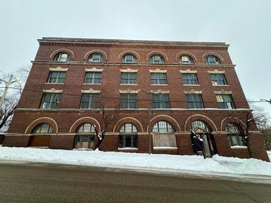 Unlock the potential of this substantial 14,700-square-foot