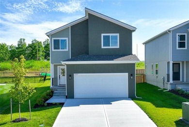 Why wait to build when you can move into this sleek - photo 1