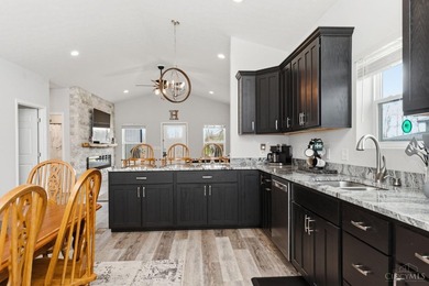 Set within the gated community of Lake Waynoka, this refined - photo 14