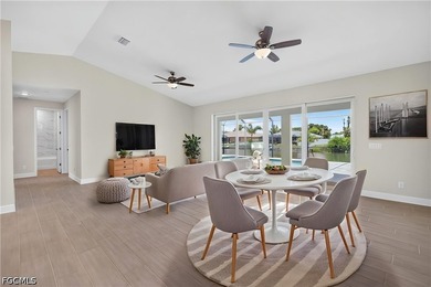 HOME IS COMPLETED!!! Long canal views, dual primary suites, a - photo 3