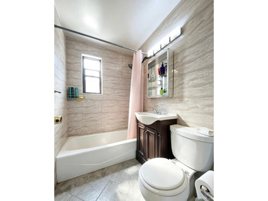 Bright corner garden-style 1-bedroom, 1-bath co-op on the 1st - photo 3