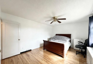 Bright corner garden-style 1-bedroom, 1-bath co-op on the 1st - photo 8