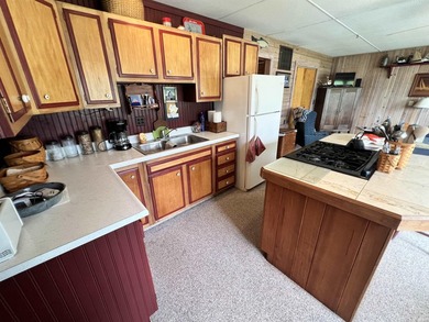 Welcome to lakefront living on beautiful Sechrist Lake! This - photo 2