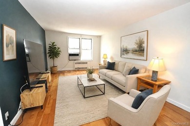 Rarely available and exceptionally spacious, this bright and - photo 1