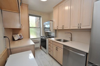 Rarely available and exceptionally spacious, this bright and - photo 2
