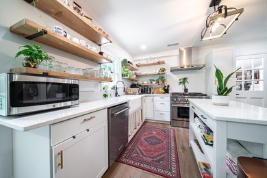 *** EXTERIOR JUST PAINTED, QUARTZ COUNTERTOPS ADDED TO - photo 4