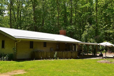 Nestled in the woods on a peaceful 3.169-acre lot, this inviting - photo 5