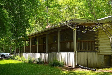 Nestled in the woods on a peaceful 3.169-acre lot, this inviting - photo 7