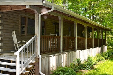Nestled in the woods on a peaceful 3.169-acre lot, this inviting - photo 8