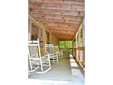Nestled in the woods on a peaceful 3.169-acre lot, this inviting - photo 9