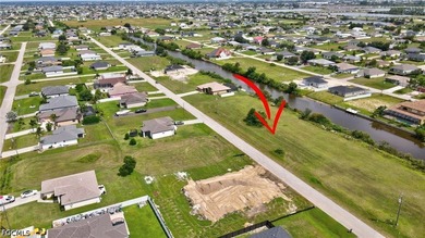 Located in Northwest Cape Coral, this canal front lot is ready - photo 3