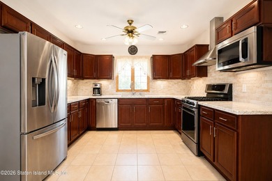 Welcome to this spacious and well-maintained two-family detached - photo 15