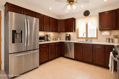 Welcome to this spacious and well-maintained two-family detached - photo 17
