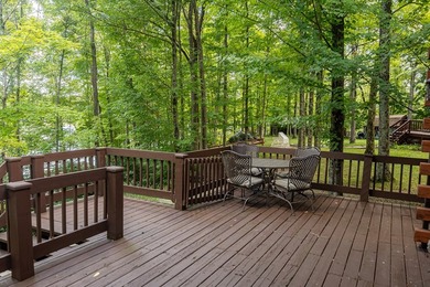 This visually stunning, premier lakefront log home on a - photo 30