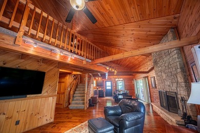 This visually stunning, premier lakefront log home on a - photo 36