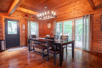 This visually stunning, premier lakefront log home on a - photo 39