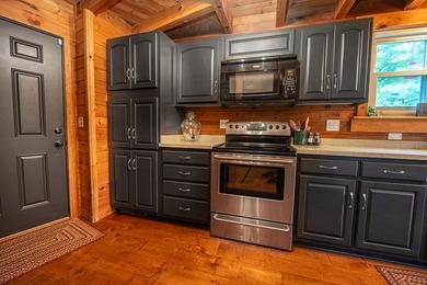 This visually stunning, premier lakefront log home on a - photo 42