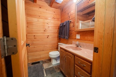 This visually stunning, premier lakefront log home on a - photo 44