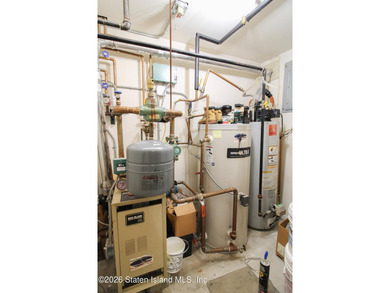 Welcome to this spacious and well-maintained two-family detached - photo 46