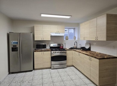Welcome to this spacious and well-maintained two-family detached - photo 48