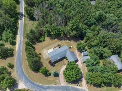 Built in 2014 and situated on a secluded 0.94-acre lot, this - photo 1