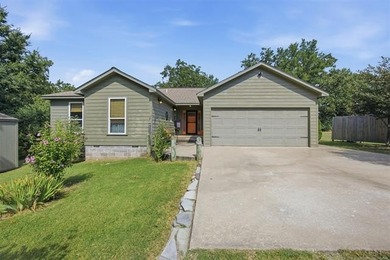 Charming 3-Bedroom, 2-Bath Lakefront Home with Hot Tub. Enjoy - photo 1