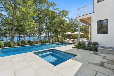 Newly completed and design-driven, this waterfront home makes a - photo 2