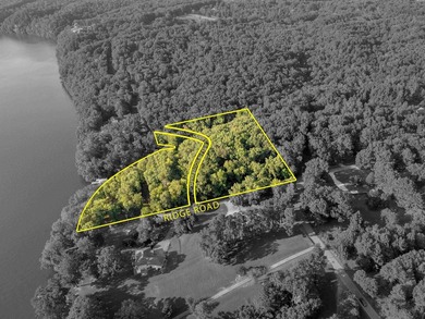 Discover this rare 6.2 acre property featuring 570' feet of - photo 2