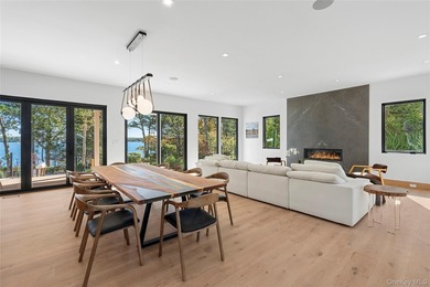 Newly completed and design-driven, this waterfront home makes a - photo 4
